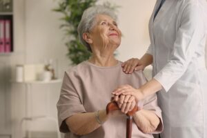 bigstock Elderly woman holding hands on 174130534