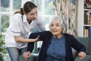 bigstock Care Worker Helping Senior Wom 103455707